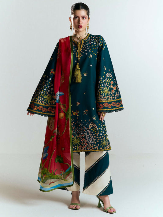 Deep teal embroidered cotton shirt with floral motifs, matching embroidered culottes with ivory trims, and digitally printed silk dupatta in vibrant reds and greens.