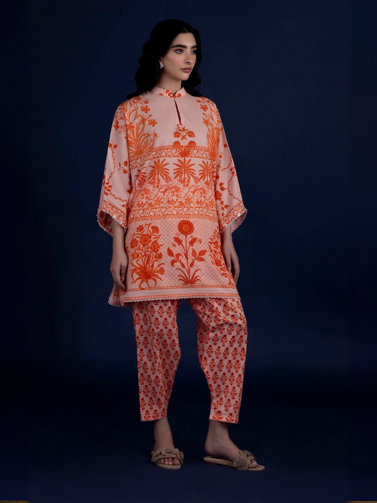 Unstitched 2-piece suit by Sana Safinaz with digitally printed lawn shirt, embroidered organza border, and rotary printed cambric pants.