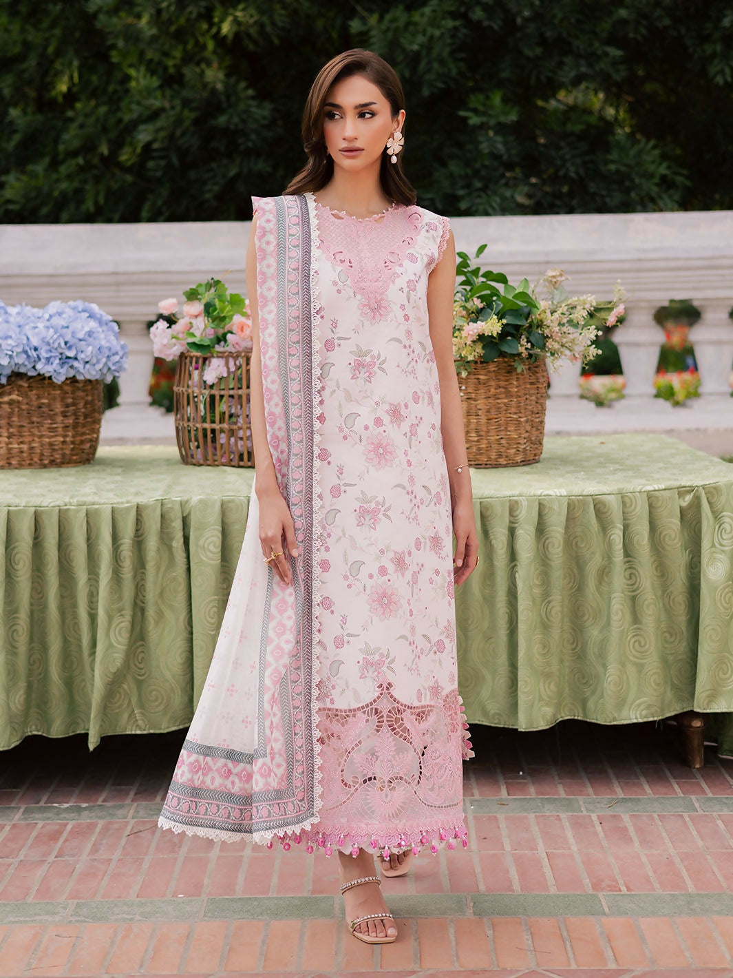 Unstitched 3-piece lawn suit with embroidered printed shirt, printed monark dupatta, and printed cambric trouser.