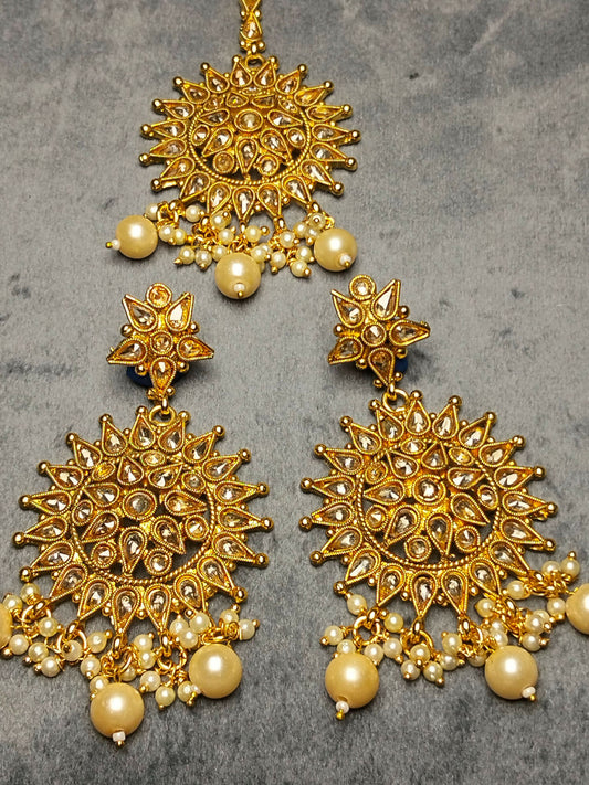 Indian Polki gold-plated earring and tikka set with semi-precious stones by H&A Jewelry, perfect for weddings and festive occasions.