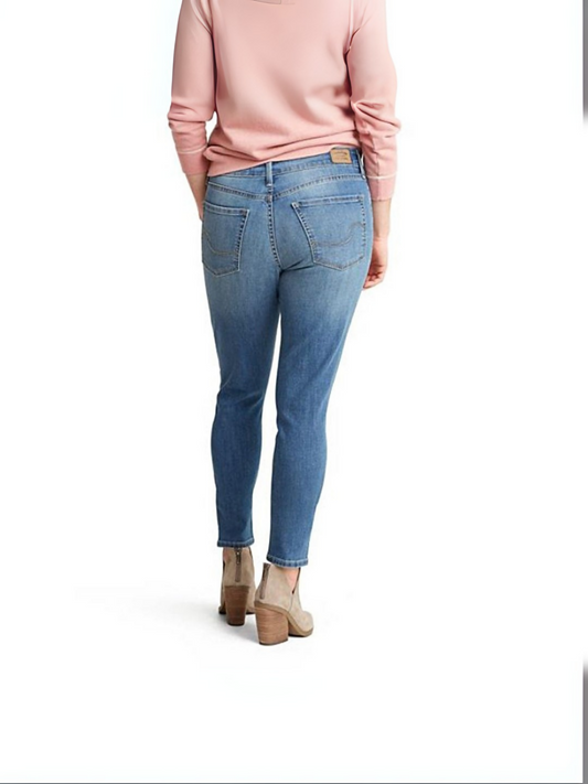 Women’s medium blue skinny jeans with mid-rise waist, slim fit, classic 5-pocket design, and subtle stretch, laid flat to show color and vintage-inspired details.