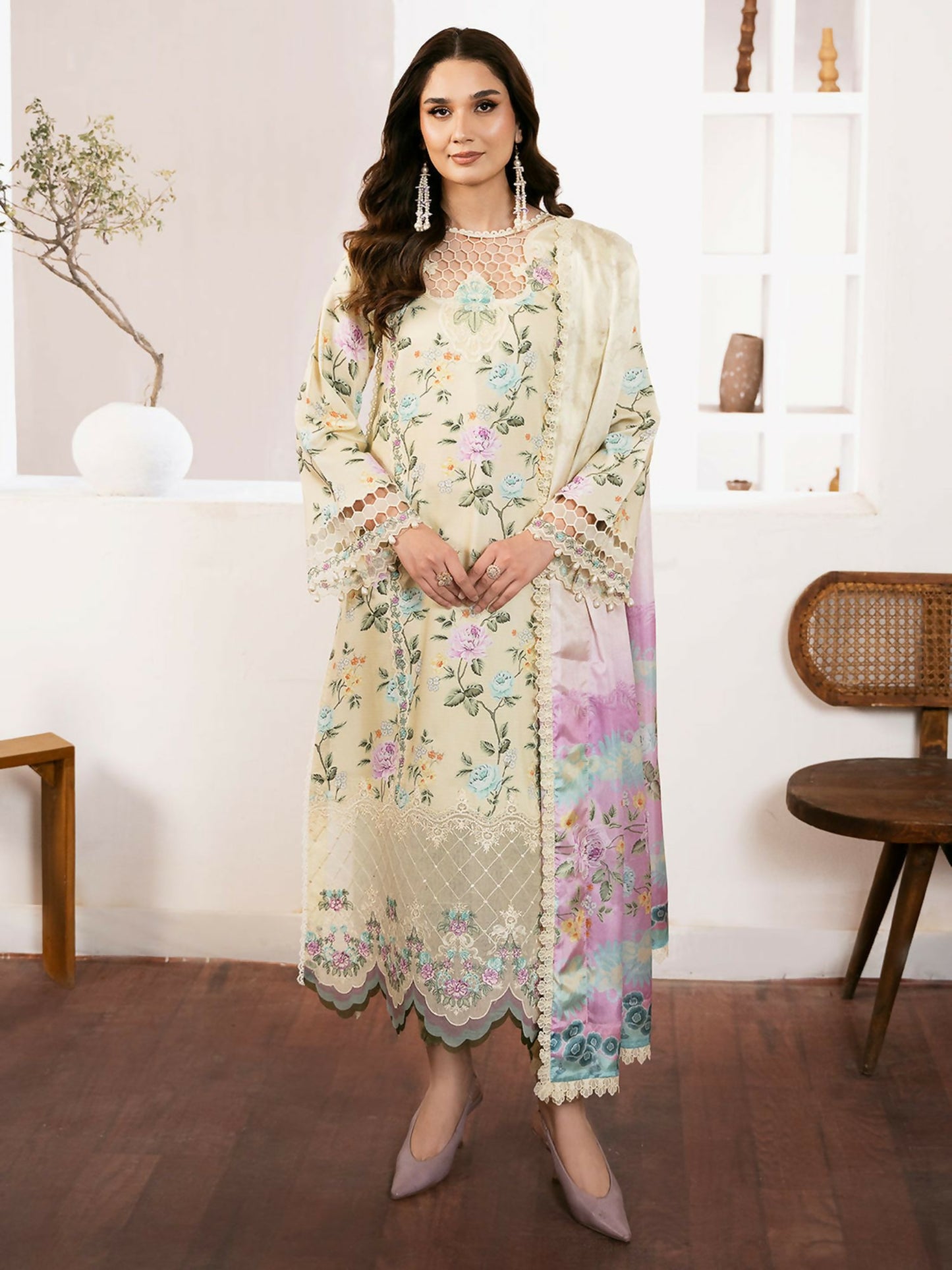 Bin Ilyas unstitched 3-piece suit with digital printed lawn shirt, embroidered organza neckline and laces, paired with digital printed dupatta and cotton trouser.