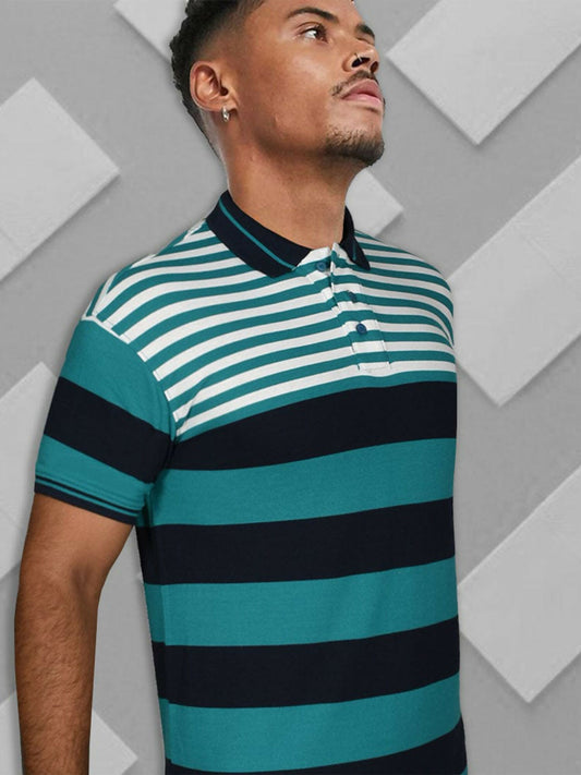 A man wearing a striped cotton polo shirt featuring a mix of wide and slim stripes, styled with a special collar and three-button placket.