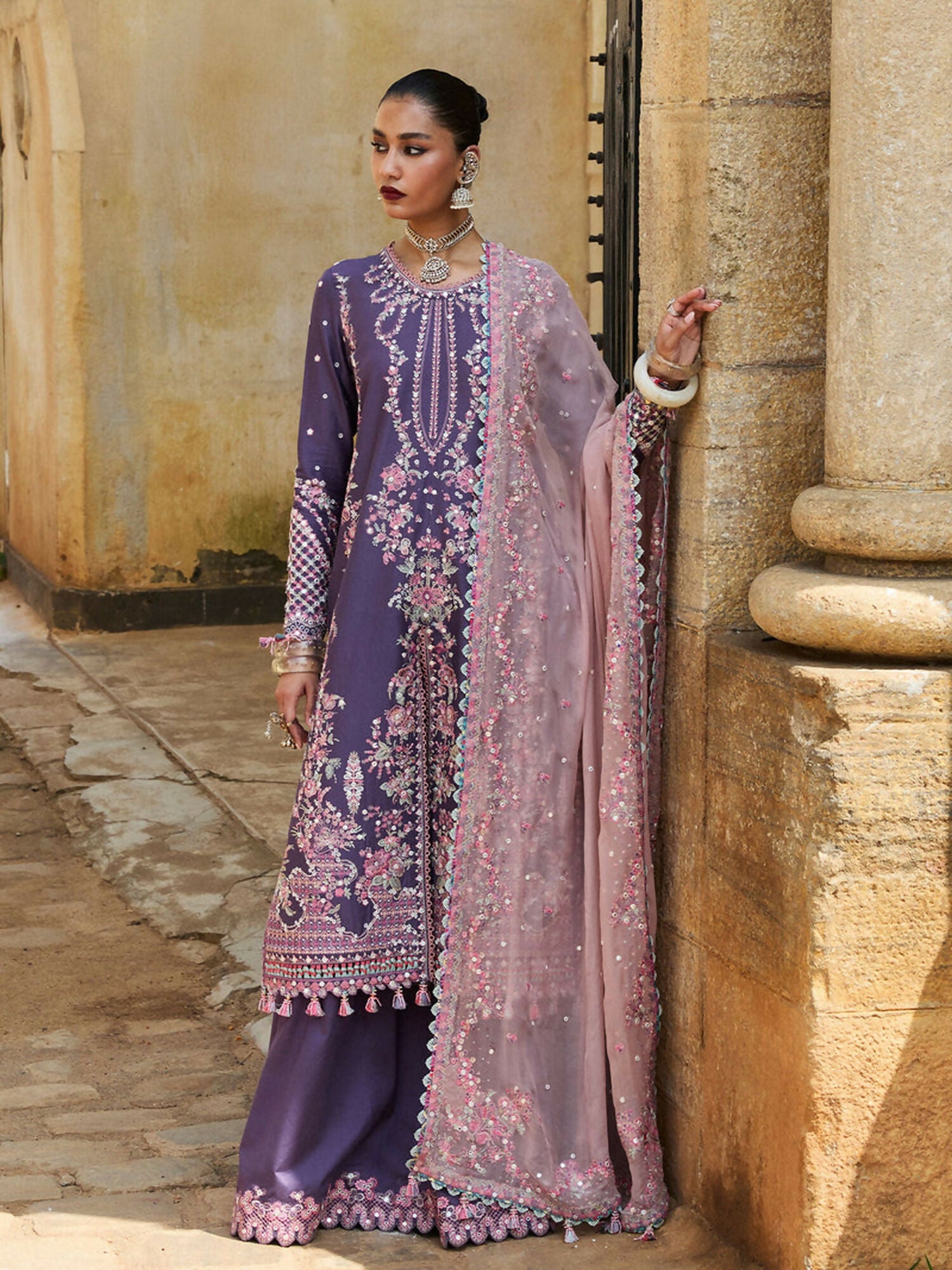 Hussain Rehar unstitched 3-piece suit with embroidered lawn shirt, chiffon embroidered dupatta, and cotton trouser, featuring floral motifs and panni detailing for an elegant traditional look.