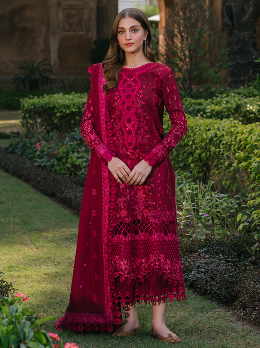 Unstitched 3-piece embroidered lawn suit by Binilyas with embroidered front, sleeves, and neckline, paired with embroidered dupatta and plain cotton trouser.