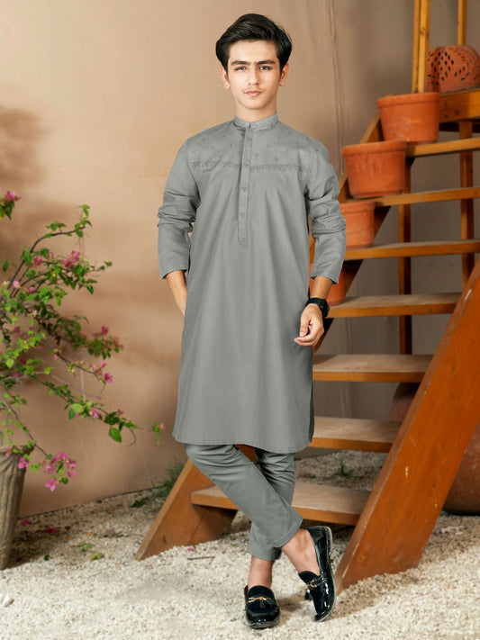 Boy wearing embroidered cotton kurta with matching trouser, full sleeves, mandarin collar, and regular fit stitched 2-piece suit set