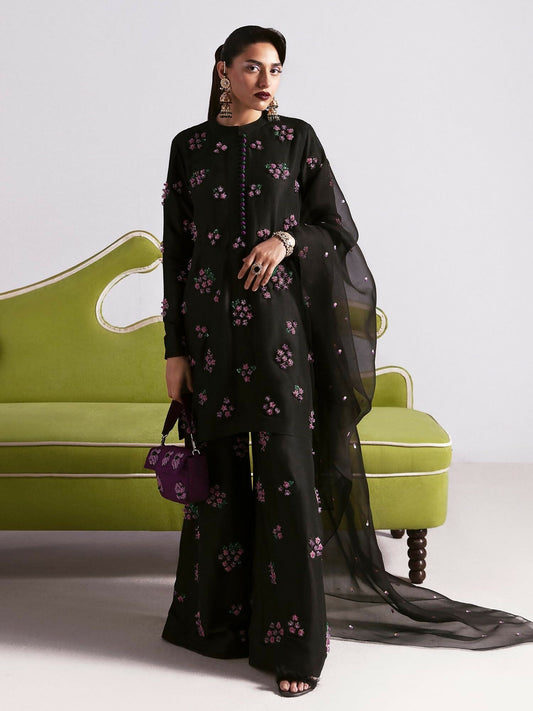 Hussain Rehar stitched 3-piece suit featuring a black raw silk embellished shirt with sequins and multicolored bugle beads, paired with raw silk palazzo pants and organza dupatta.