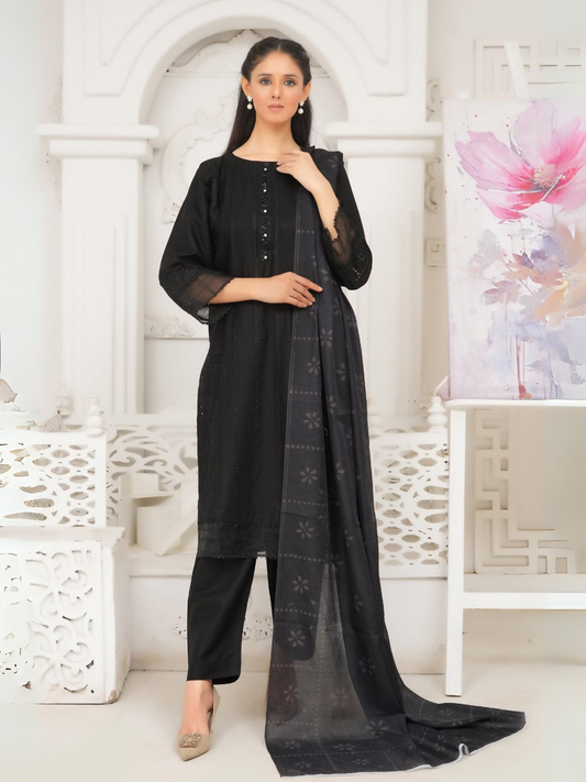 Woman wearing stitched 3-piece suit with fully embroidered shirt, stone-encrusted neckline, stitched patchwork on sleeves and daman, digitally printed dupatta, and flowing wide-leg matching trouser.