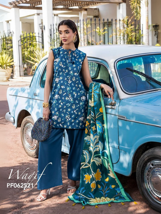 Unstitched 3-piece suit with small floral printed lawn shirt, bold floral printed dobby voil dupatta, and dyed cotton trouser, ideal for summer tailoring and seasonal wear.