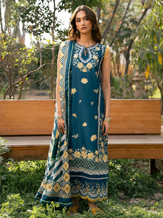 Unstitched teal embroidered lawn outfit with mustard floral motifs, lace detailing, printed silk dupatta, and dyed cotton trouser.