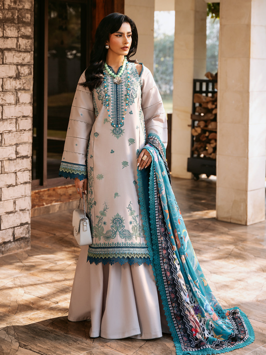 Three-piece embroidered lawn suit with detailed front panels, printed silk dupatta, and plain dyed cotton trouser.