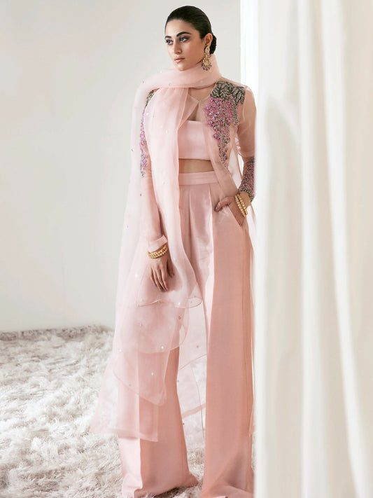 Hussain Rehar blush pink organza jacket with multicolored floral embellishments, paired with raw silk palazzo pants, satin slip, and sprayed organza dupatta.