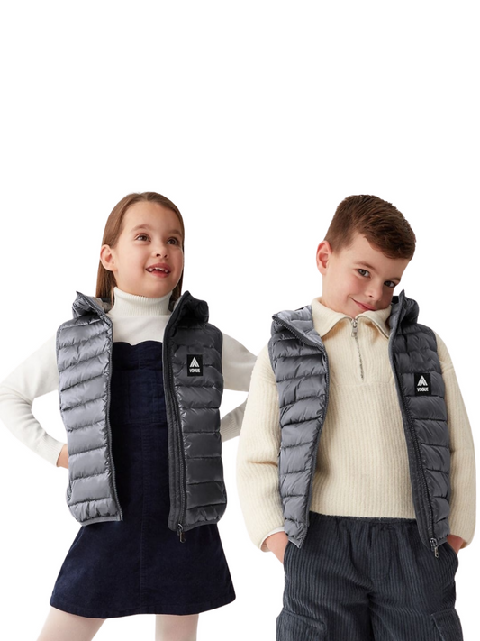 Kids’ quilted puffer gilet in premium imported fabric, featuring heavy-duty front zipper, two side pockets, and wind, snow, and water-resistant design