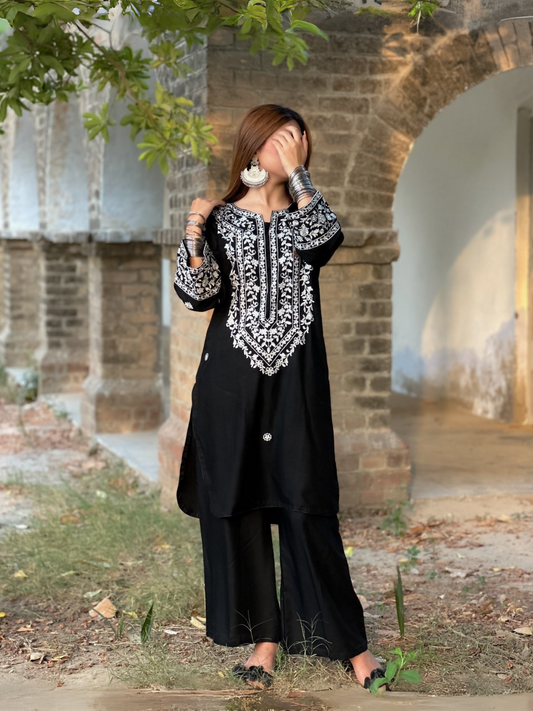 Stitched 2-piece linen suit with long neck embroidered shirt and plazo from Tehzeeb Libas