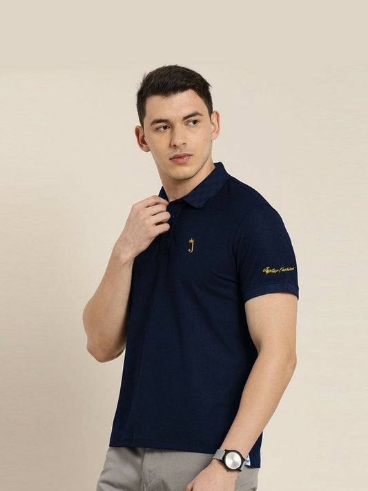 Jupiter men’s polo shirt with textured collar, soft viscose-cotton blend, and embroidered logos on chest and left arm.