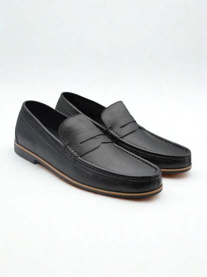 Sleek casual leather shoes with a relaxed design, offering versatile style and all-day comfort for effortless everyday wear.