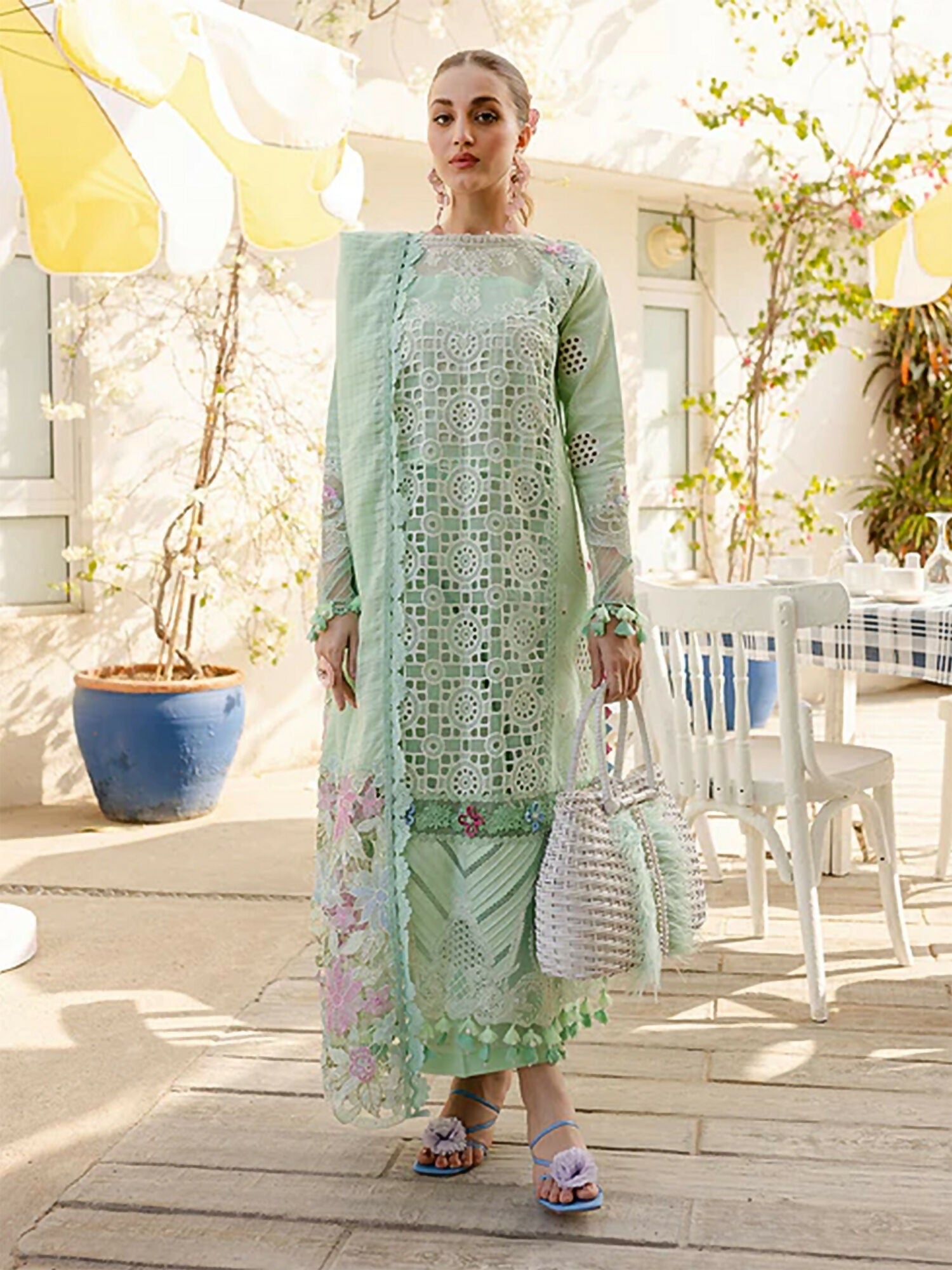 Unstitched 3-piece suit with embroidered lawn front and sleeves, embroidered neckline and borders, check monark dupatta with embroidered organza pallus, and dyed cambric trouser, ideal for elegant everyday or festive wear.