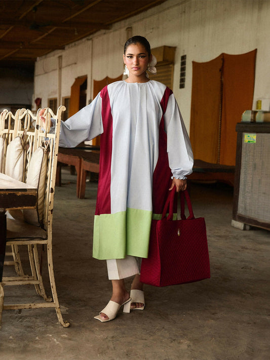 Girl wearing cotton long flared multi-colored shirt with gathered neckline and ivory culottes, stitched 2-piece suit