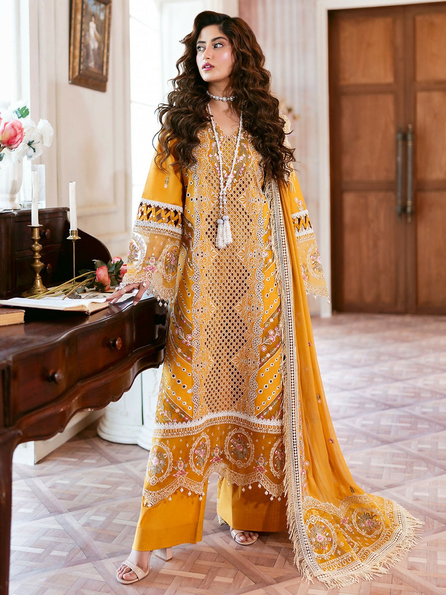 Stitched 3-piece suit from Mahnur Sophie Luxury Lawn with embroidered shirt, chiffon embroidered dupatta, and dyed trouser.