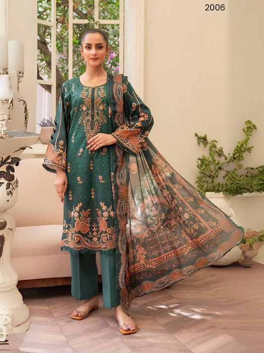 Emerald green unstitched 3-piece lawn suit by Sitara Studio with copper floral prints, dyed trouser, and matching digital printed dupatta.