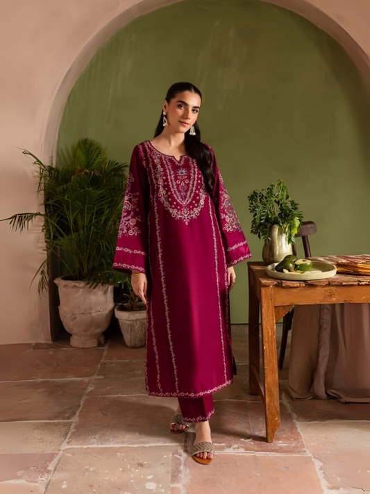 Stitched 2-piece lawn suit with heavy embroidery on shirt and trouser from Tehzeeb Libas.