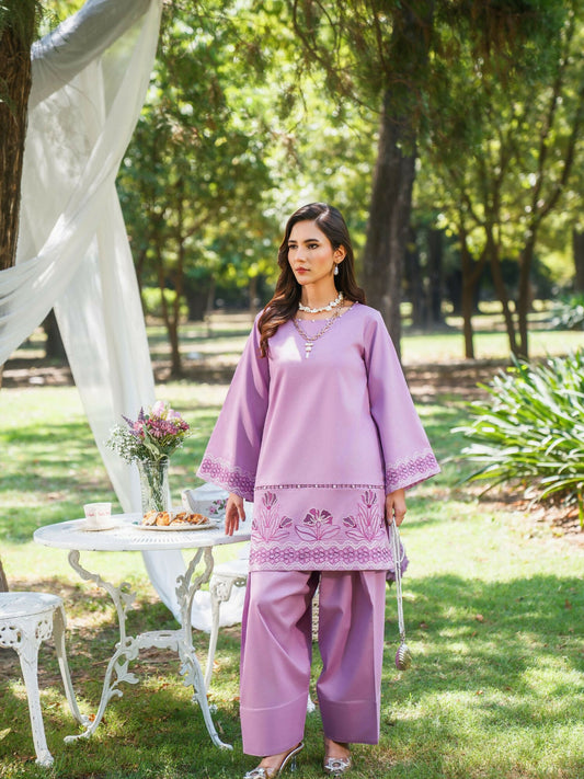 Lilac stitched two-piece suit with embroidered front and sleeves, lace details, pearl embellishments, paired with farshi shalwar by Sehrish Kanwal.