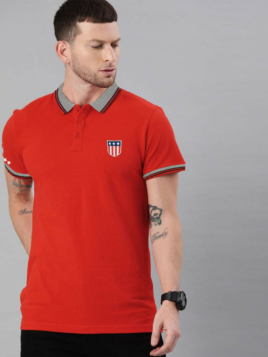 A stylish polo shirt featuring a jacquard knit collar and cuffs, front and arm embroidery including three stars, and side hem slits.