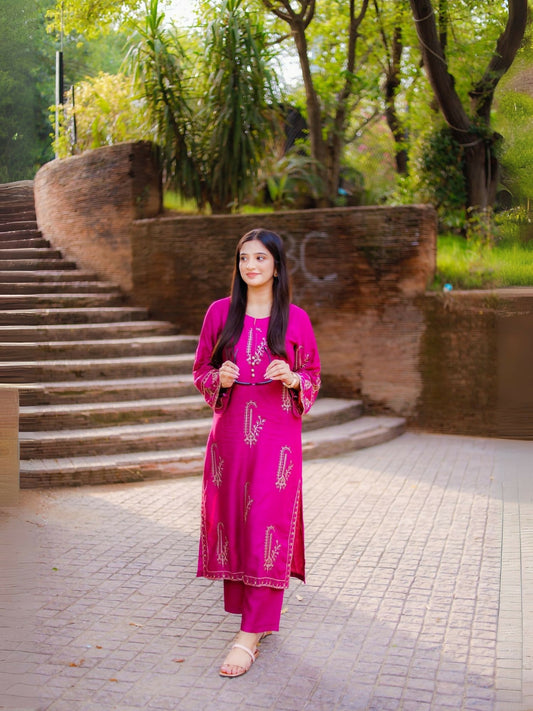 Stitched 2-piece suit with heavily embroidered summer lilen shirt and plain trouser from Tehzeeb Libas.