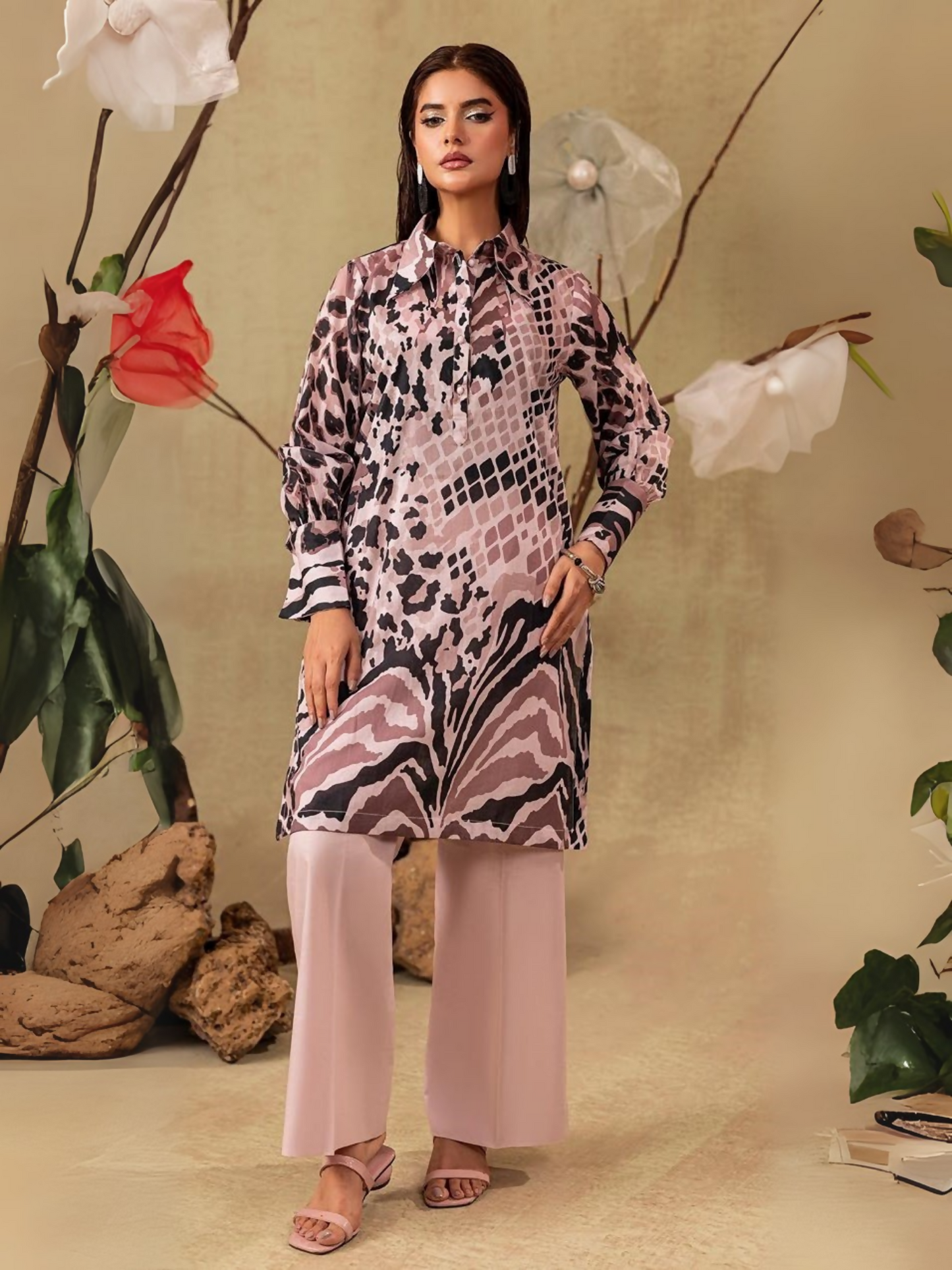 Unstitched 2-piece suit with abstract printed shirt and plain dyed trouser, perfect for casual wear.