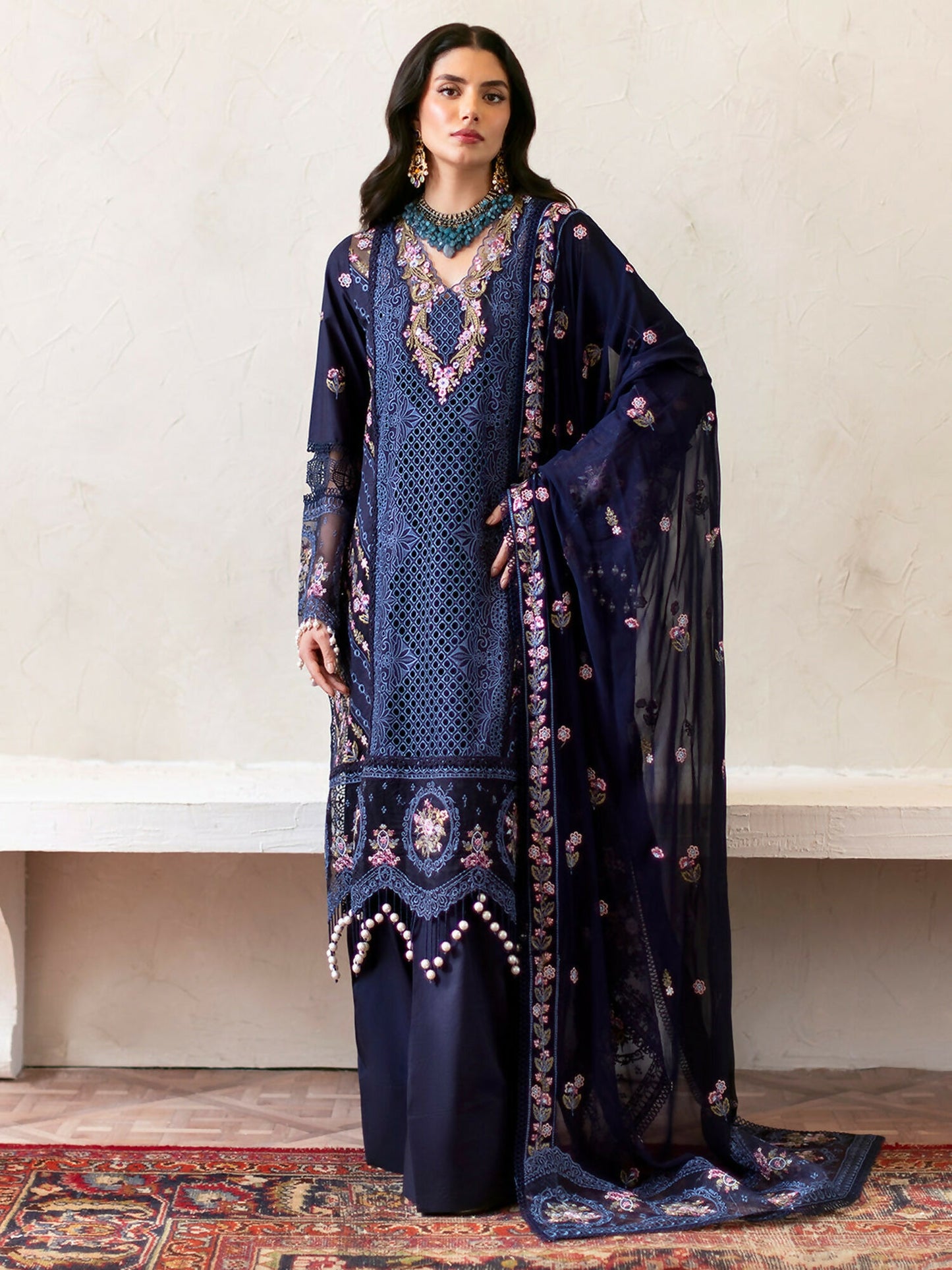 Unstitched embroidered 3-piece suit from Mahnur Sophie Luxury Lawn Collection with embroidered lawn shirt, chiffon embroidered dupatta, and dyed trouser.