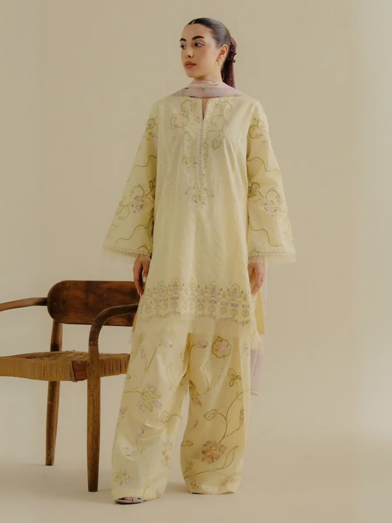 Unstitched 3-piece embroidered suit with jacquard shirt panels, embroidered cambric trouser, and chiffon dupatta—ideal for formal or semi-formal wear.