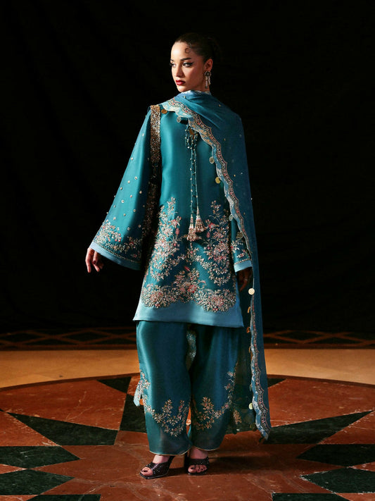 Hussain Rehar unstitched raw silk 3-piece suit with embroidered shirt, chiffon embroidered dupatta, and raw silk embroidered shalwar.