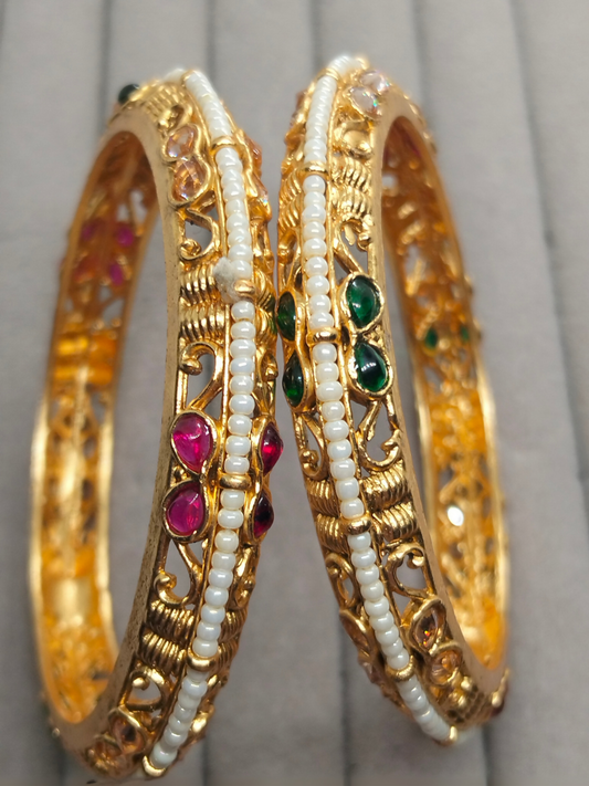 H&A Jewellery handcrafted antique gold bangles with pearl beadwork and semi-precious stones.