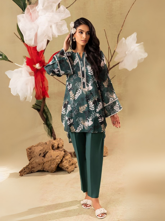Unstitched 2-piece suit with green leafy printed shirt and plain dyed green trouser, ideal for casual wear.