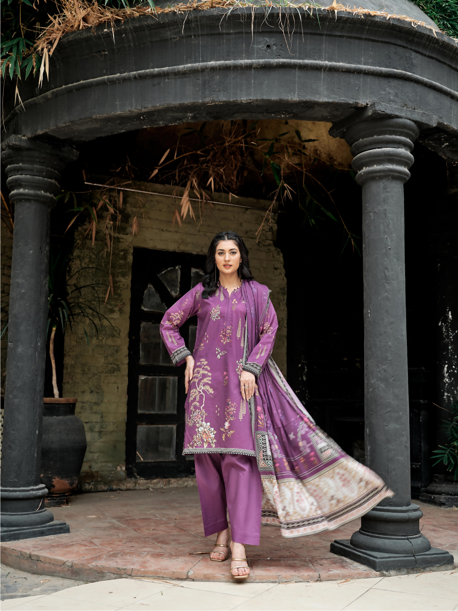 Unstitched 3-piece suit with a digital printed lawn shirt featuring floral vines, a matching digital printed lawn dupatta, and a dyed lawn trouser.