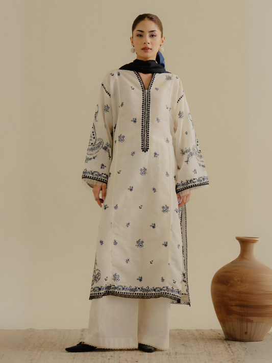 Unstitched 3-piece embroidered suit featuring all-over embroidered lawn shirt with front and back panels, embroidered cambric trouser, and digital printed silk dupatta for a sharp and elegant look