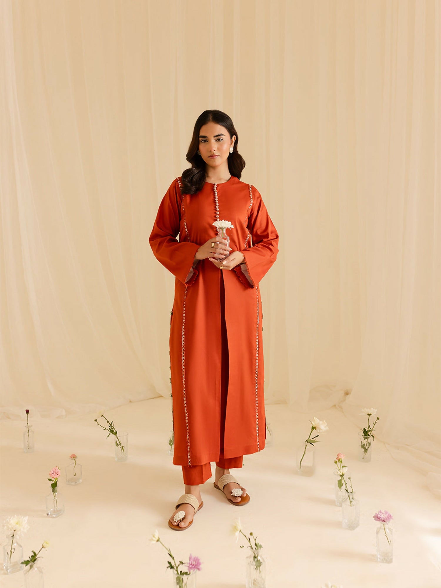 Mahnur stitched 2-piece pret suit with a shirt featuring fine detailing and a plain trouser for casual wear.