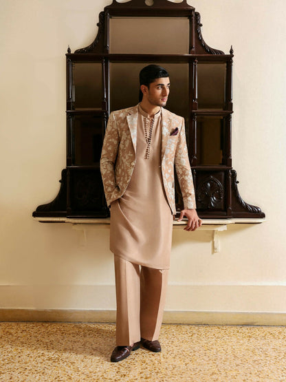 Hussain Rehar warm beige raw silk three-piece ensemble with embroidered floral blazer, loop-button kurta, and straight trousers.