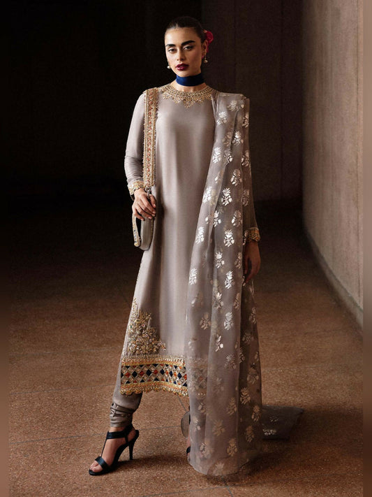 Stitched 3-piece suit by Hussain Rehar with grey long raw silk shirt embellished on border, neckline, and sleeves, paired with sequin-sprayed chooridaar and printed organza dupatta.