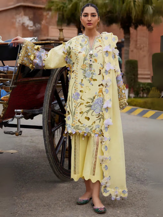 Unstitched 3-piece suit  by Elan with embroidered lawn cutwork shirt, khaddi net dupatta with floral embroidery, and dyed cambric trouser.