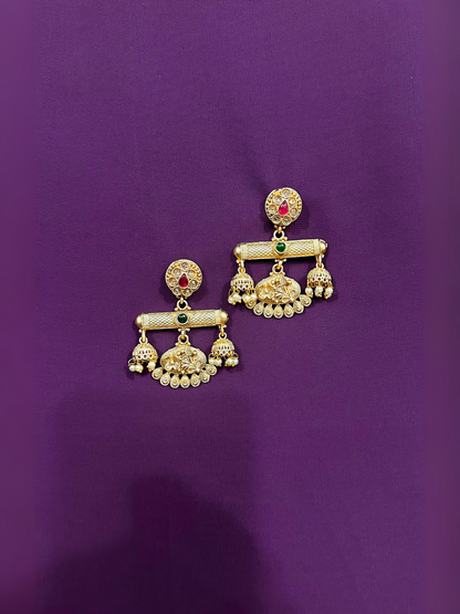 Glitter Jewellery traditional gold-toned earrings with kundan stones and pearl drop detailing.