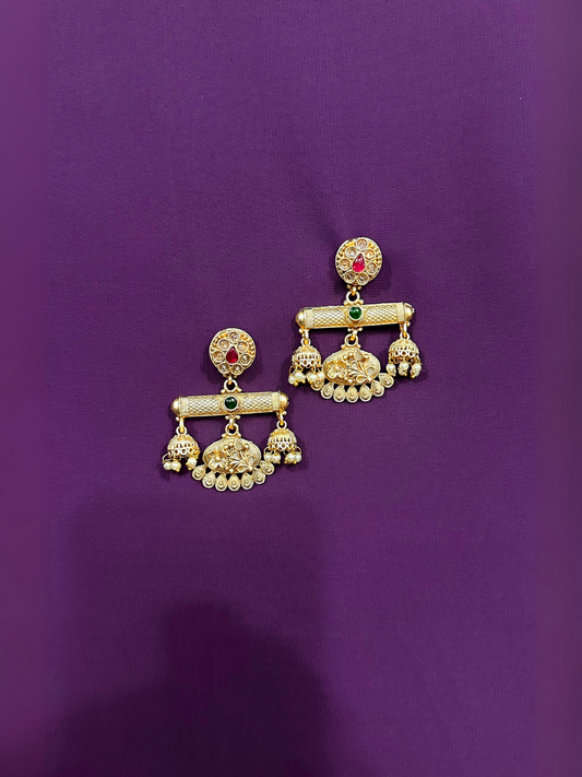 Glitter Jewellery traditional gold-toned earrings with kundan stones and pearl drop detailing.