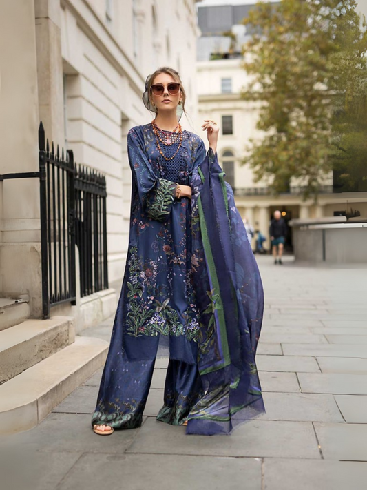 Unstitched 3-piece satin suit featuring a printed shirt with embroidered organza neckline, daman, sleeve, and slit patches, paired with a printed satin trouser and printed silk dupatta.
