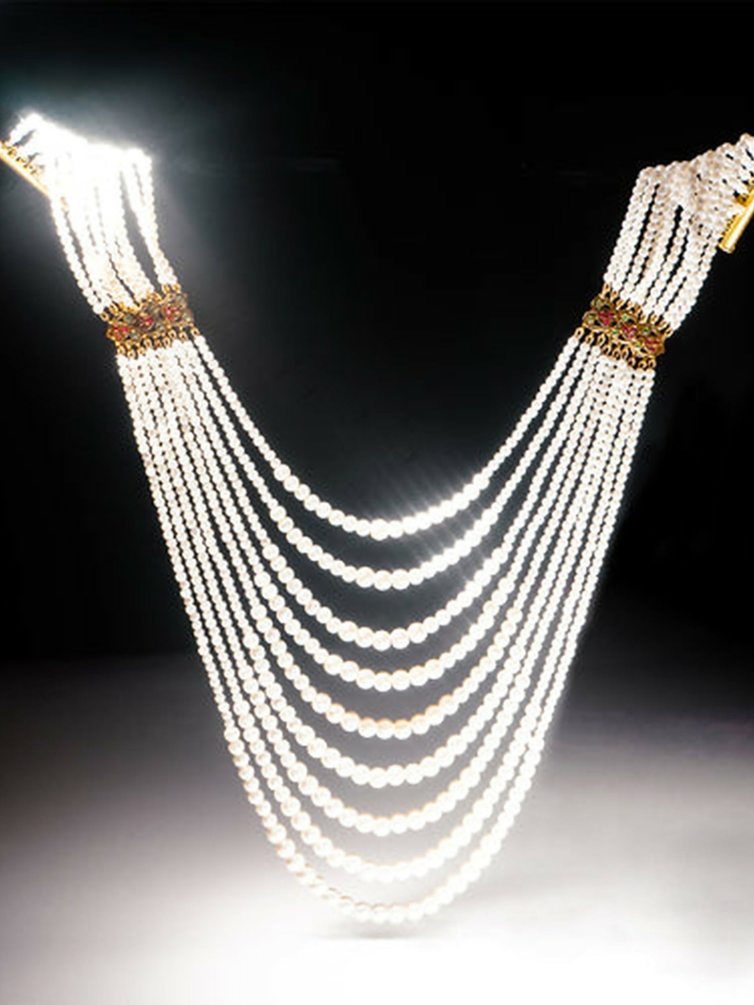 Jugnu by Hussain Rehar Pearl Meenakari necklace with strands of white pearls and vibrant Meenakari heart motifs, timeless romantic artisanal accessory.