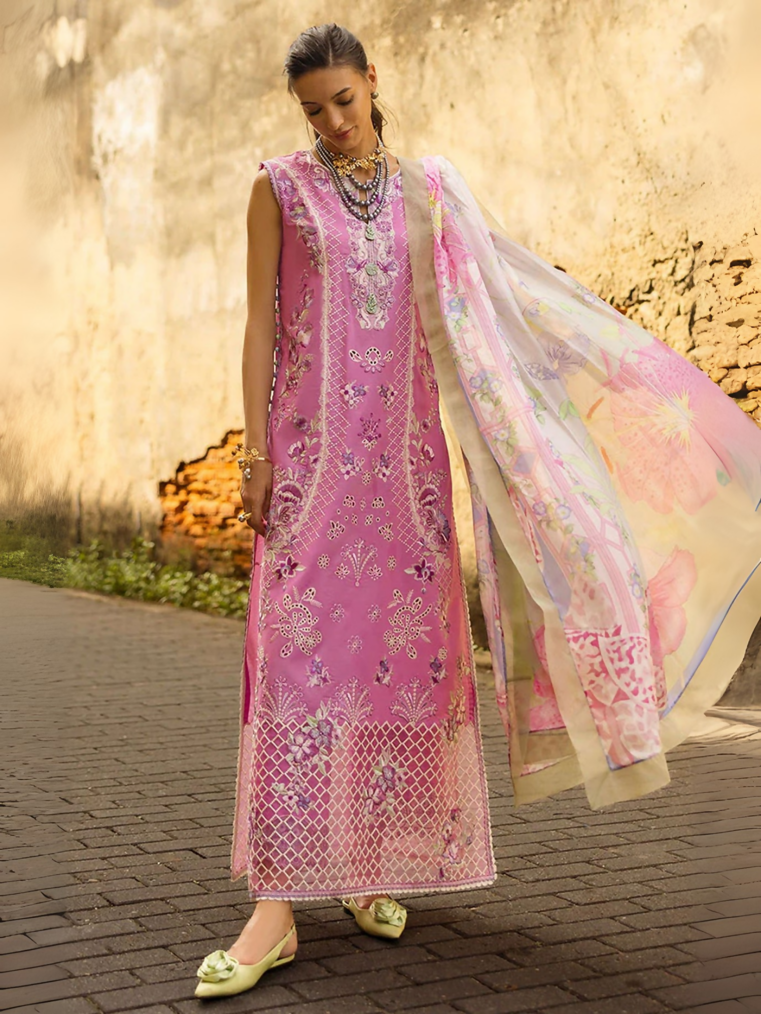 Mushq unstitched 3-piece suit with chikan embroidered lawn shirt, silk and organza motifs, crochet lace, handmade tassels, digital printed silk dupatta, and cotton trousers with organza border.
