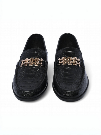 Polished leather loafers with a bold, regal design and refined finish, crafted for formal wear and confident style