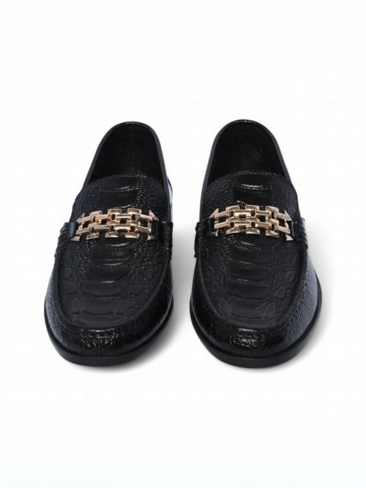 Polished leather loafers with a bold, regal design and refined finish, crafted for formal wear and confident style