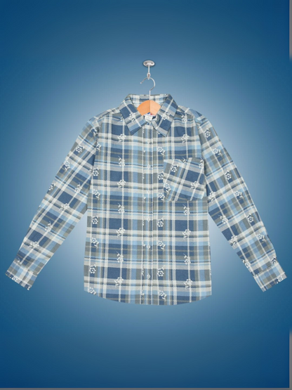 Flat lay of a long-sleeve checkered flannel shirt with a button-down front and single chest pocket, displayed on a hanger.
