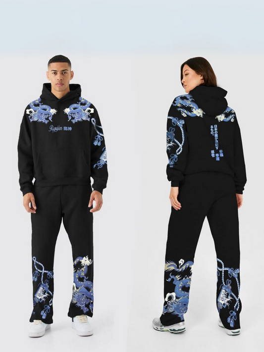 Unisex oversized fleece trackpair featuring puff print, Ryujin embroidery, and 350 GSM fabric for a warm, trendy look.