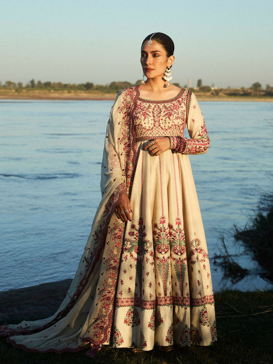 Beige lawn peshwas with red and green floral and geometric embroidery, matching cotton trousers, and chiffon dupatta with floral motifs, decorative border, and tassels.